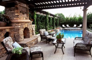 Patio with a fireplace